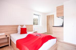 Postel nebo postele na pokoji v ubytování B&S Hotel