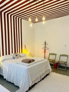 Katil atau katil-katil dalam bilik di Casa Aconchego