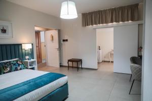 Postel nebo postele na pokoji v ubytování B&B Guida