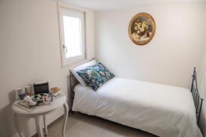 Postel nebo postele na pokoji v ubytování B&B Guida
