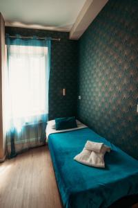Postel nebo postele na pokoji v ubytování Hotel Domus Tiberina