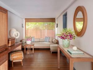 Raffles Maldives Meradhoo客房内的一张或多张床位