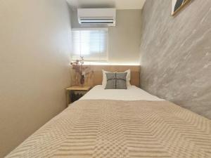 11全新装修 2室1厅1浴室1卫生间 设施齐全 最大6人 2 rooms 1dining room 2bathrooms 2toilets Max 6P 免费无线网络にあるベッド
