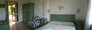 Voodi või voodid majutusasutuse Hotel Il Cipresso toas