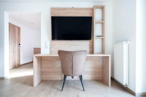 TV a/nebo společenská místnost v ubytování B&S Hotel