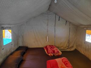 Postel nebo postele na pokoji v ubytování Baba tent House