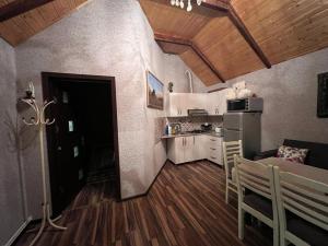 Kuchyň nebo kuchyňský kout v ubytování Shahdag Suvacal House + 11 fotografií