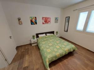 Posteľ alebo postele v izbe v ubytovaní Apartments and Rooms King