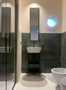 Koupelna v ubytování La Locanda Azzurra + 36 fotografií