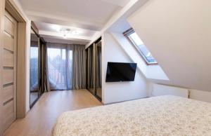 Μια τηλεόραση ή/και κέντρο ψυχαγωγίας στο Apartamentai Pervalkoje