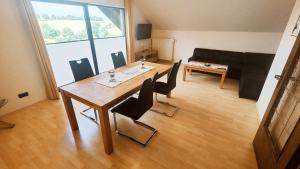 TV a/nebo společenská místnost v ubytování Ferienwohnung Blome