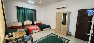 Giường trong phòng chung tại Gisa Hostel All Private Ensuite Rooms