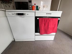 Η κουζίνα ή μικρή κουζίνα στο Appartement entier avec 2 terrasses