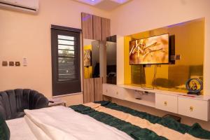 TV a/nebo společenská místnost v ubytování Norvits Hotel