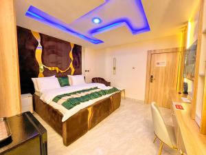 Postel nebo postele na pokoji v ubytování Norvits Hotel