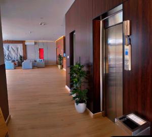 a hallway of an office building with a hallway sidx sidx sidx at ابيات الشمال 3 in Rafha