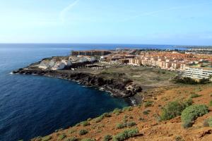 an aerial view of a town on the shore of the ocean at Relax studio Primavera in Las Galletas