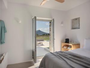Postel nebo postele na pokoji v ubytování Mosaic Villas, Paros + 76 fotografií