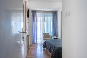Postel nebo postele na pokoji v ubytování Pension Rušev