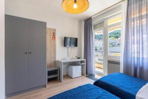 Postel nebo postele na pokoji v ubytování Pension Rušev