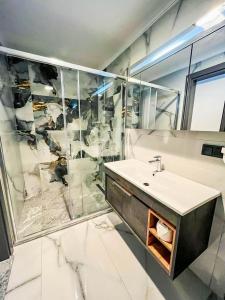 Ванная комната в Ida Hotel
