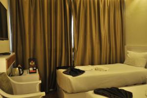 Voodi või voodid majutusasutuse Salma Hotel Cairo toas