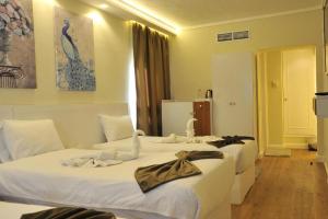 Voodi või voodid majutusasutuse Salma Hotel Cairo toas