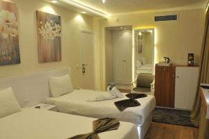 Voodi või voodid majutusasutuse Salma Hotel Cairo toas