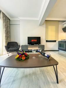 Телевизор и/или развлекательный центр в Ida Hotel