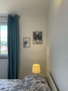 Posteľ alebo postele v izbe v ubytovaní Relax