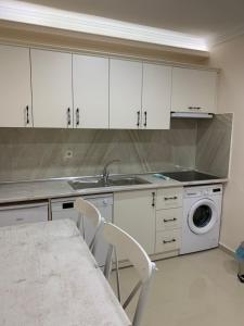 مطبخ أو مطبخ صغير في Esa Apart Hotel