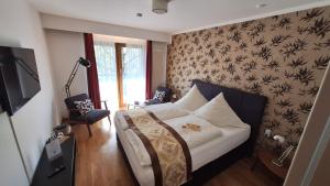 TV a/nebo společenská místnost v ubytování Solitaire Hotel