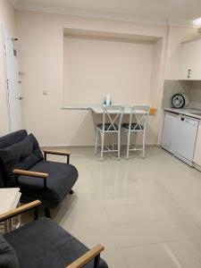 مطبخ أو مطبخ صغير في Esa Apart Hotel