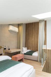Postel nebo postele na pokoji v ubytování DOM hotel + 37 fotografií