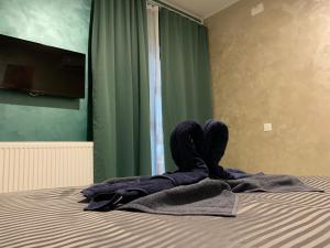 Postel nebo postele na pokoji v ubytování Neversea house
