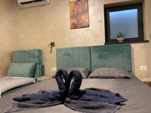 Postel nebo postele na pokoji v ubytování Neversea house