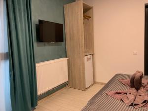 TV a/nebo společenská místnost v ubytování Neversea house