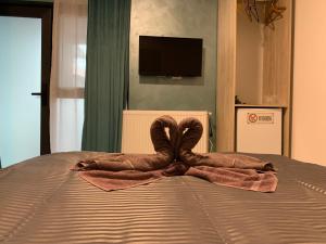 Postel nebo postele na pokoji v ubytování Neversea house