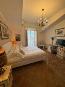 Postel nebo postele na pokoji v ubytování L'Elisea Maison De Charme