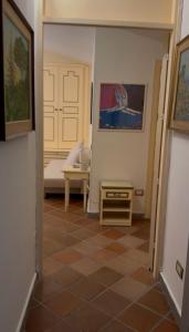 Postel nebo postele na pokoji v ubytování L'Elisea Maison De Charme