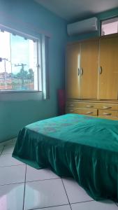 Ένα ή περισσότερα κρεβάτια σε δωμάτιο στο Apartamento