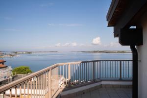 a view of the water from a balcony at Hotel Eldorado, Depandance & Apartments in Grado