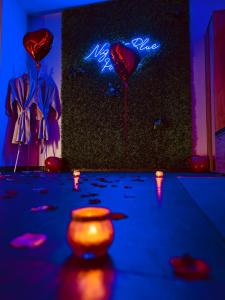 a room with a group of hearts and balloons at Loft privatif avec Jacuzzi et sauna All in One in Entzheim