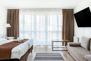 Posteľ alebo postele v izbe v ubytovaní Villa Zdrój