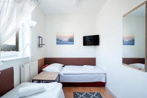 Posteľ alebo postele v izbe v ubytovaní Villa Zdrój