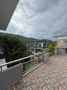a view from the balcony of a house at Spacious and cozy Thai House in Ban Bang Khu