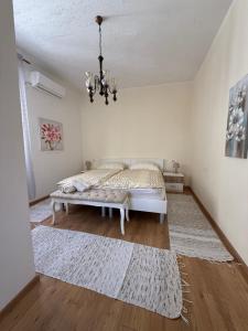 Ein Bett oder Betten in einem Zimmer der Unterkunft Apartment Batinica