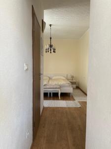 Ein Bett oder Betten in einem Zimmer der Unterkunft Apartment Batinica