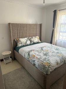 Ένα ή περισσότερα κρεβάτια σε δωμάτιο στο Stylish Apartment Ideal for long Stays