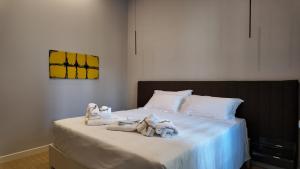 Postel nebo postele na pokoji v ubytování Amelié Lago d’Orta Hotel